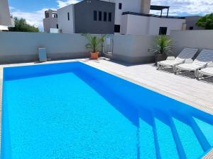 Apartment Erdgeschoss-Ferienwohnung mit Garten und Pool by Interhome