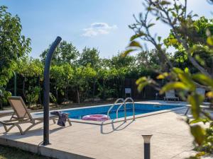 Apartment attraktive Wohnung mit privatem Pool by Interhome