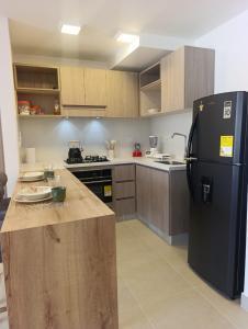 2 Piscinas en condominio y BBQ privado