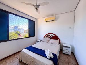 Apê com AC, Garagem | 250m Praia de Canasvieiras