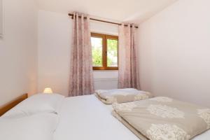 Apartments with a parking space Mali Losinj (Losinj) - 376