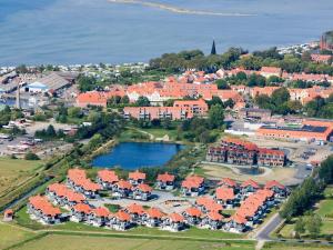 6 person holiday home on a holiday park in Bogense