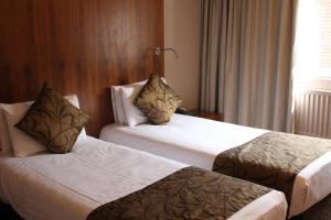 Twin Room room in Aubrey Park Hotel