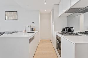 004S ABNB Style 2BR Pool & Gym 5 mins walk to Tram Near Crown