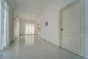 Collection O Kulathoor Technopark Formerly United Mansions