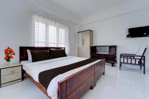 Collection O Kulathoor Technopark Formerly United Mansions