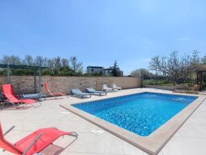 Apartment Wohnung in Fažana mit gemeinsamem Pool und Garten by Interhome