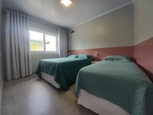 Casa de 4 Quartos, Proximo ao Mar Em Capão da Canoa