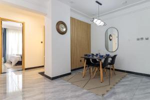 newly furnished two bedroom apartment with swimming pool, fully equipped gym, private parking space ,children playground and unbeatable scenic city views