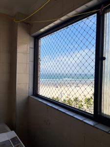 Apto Beira Mar na Guilhermina Wi-Fi ,Garagem,elevador e janelas com rede de proteção Até 6 pessoas