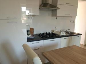 Apartment Wohnung mit Blick auf das Wasser by Interhome