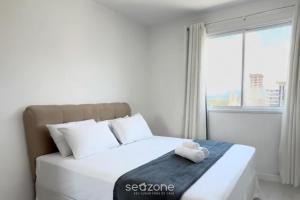 Apto c churrasq. e varanda, 450m da Praia SIT1202