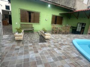 Casa com Piscina Pet Friendly em Itanhaém Até 10 Pessoas