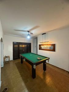 Casa com Piscina Pet Friendly em Itanhaém Até 10 Pessoas