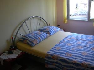 Apartment Wohnung Hama Komunela mit Garten und Stellplatz by Interhome