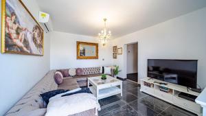 Seafront Villa Mijo by Villas Guide