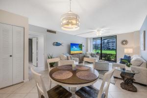 Walkout condo with beach access, pool and pickleball