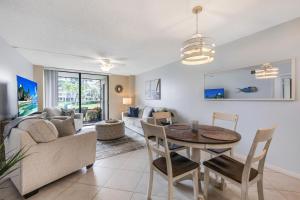 Walkout condo with beach access, pool and pickleball