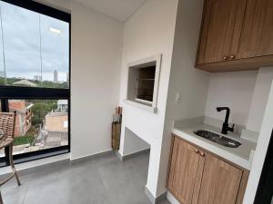 Apto cchurrasq. próx. da Praia em Perequê FEL0502