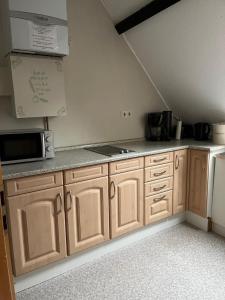 Ferienwohnung Vierkanthof 1834 OG mit Dachterrasse