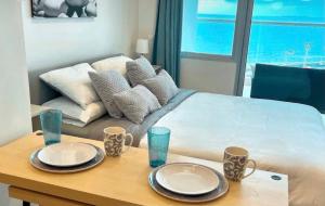 Apartasuit Resort CTG Beach con vista al mar- central 5 min aeropuerto