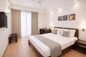 EMBLEM Hotel - Arjun Marg, Golf Course Road, Gurgaon