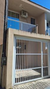 Casa aconchegante a poucos metros da praia