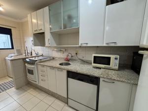 Vista Mar com Churrasqueira, Climatizado e Garagem