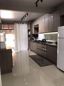 Apartamento casa a 200m da Praia do Campeche