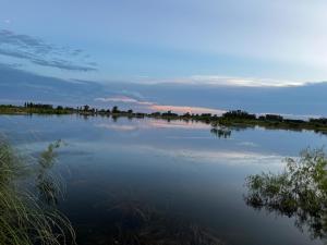 Eco house in a gated neighborhood with a lagoon and dock