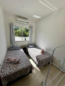 Hospedagem da Lu a 400m da Praia - 3 Dorms-Suíte - Climatizado