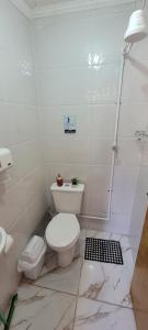 Casa térrea a 1km da praia com ar condicionado