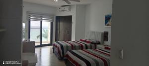 MAKANA Tonsupa - Suites y Departamentos Familiares - Deluxe Suites