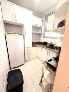 Apto térreo - praça mini golf - Sacada - Garagem - 3 quadras do mar e 1 do centro