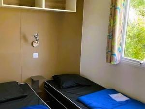 Mobil-home 27m² à Saint-Gérons avec terrasse - API-1-52-1316