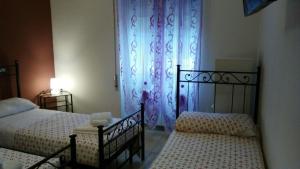 Three-Bedroom Apartment room in Marco E Laura B&B