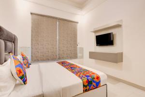 FabHotel Paradise Palace