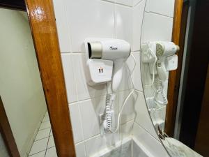 Flat confortável com área home office e garagem