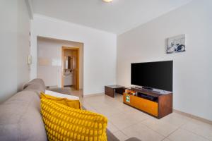 Bright 2BR with Pool near Beach by LovelyStay