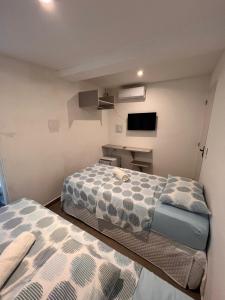 Manaira Suite 03 com 2 camas de solteiro ou 1 de casal