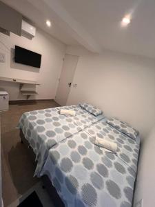 Manaira Suite 03 com 2 camas de solteiro ou 1 de casal