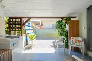 Recanto do Vô Bibi, pé na areia e no Beto Carreiro Word