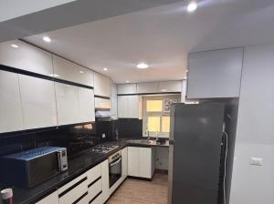 3BR Apartment Steps from the Pyramids & GEM