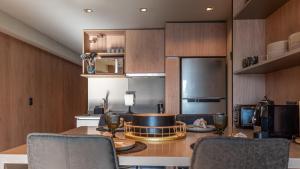 Lake Inn - Departamentos con costa de Lago