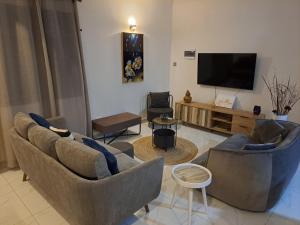 Nayuha Apt A1 - 3 bed rooms - Reach for the beach, across the road