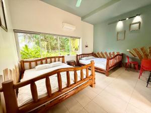 Guitar DC Homestay Suitable for 12 to 18 people