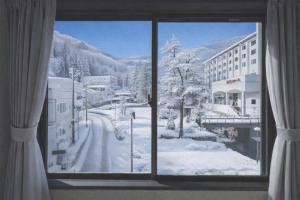 AURA YUZAWA Apartment Hotel - 1Bedroom Apartment with Living Dining Kitchen Sleeps 2 to 4, Bedroom with 2-Double Bed, Living Room with 1-Sofa Bed