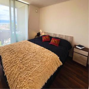 Urban apartment with a view of the lake and the volcano