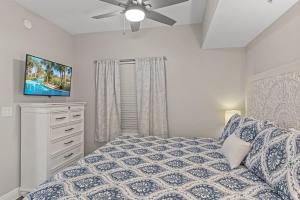Waters Edge 115 ~ Ground Floor ~ Beach Boardwalk Right Outside Your Door!