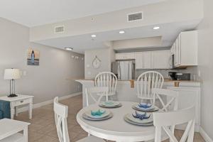 Waters Edge 115 ~ Ground Floor ~ Beach Boardwalk Right Outside Your Door!